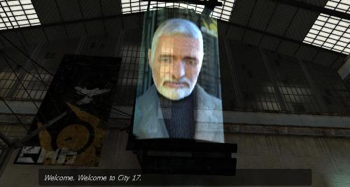 A monitor suspended above the player that holds Dr. Breen's face. He is an elderly white male with a full head of hair and beard, both white in color. The subtitles state, "Welcome. Welcome to City 17."