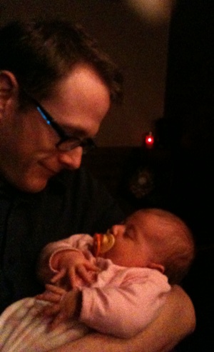 Myself holding my niece, Alice (age: two months). She's also been a healthy distraction this month.